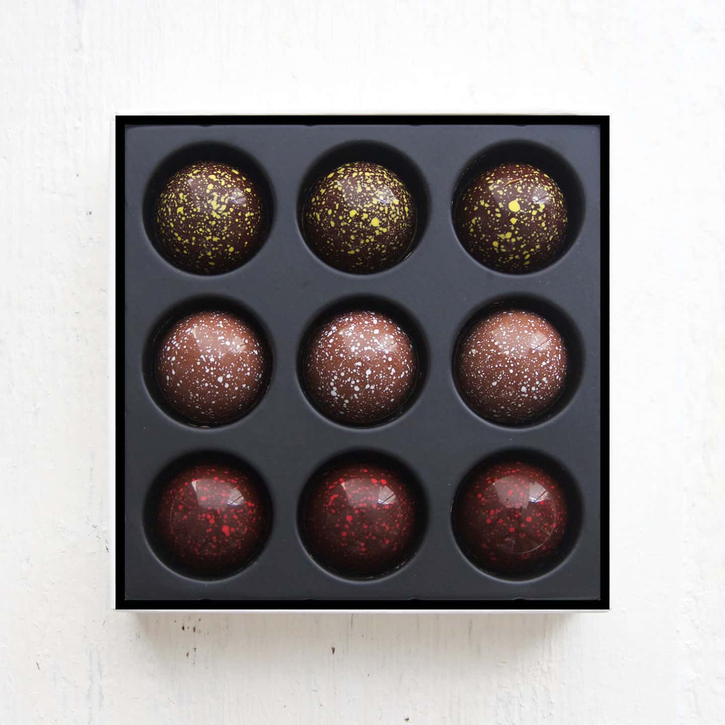 Caramel Chocolat Noir et Lait Fruits 55g - 9 pièces
