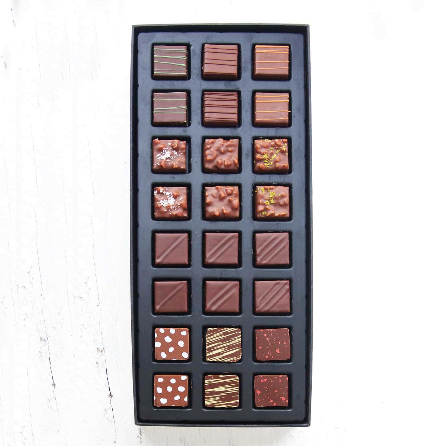 Assortiment Chocolats Noir et Lait 125g - 24 pièces Collector